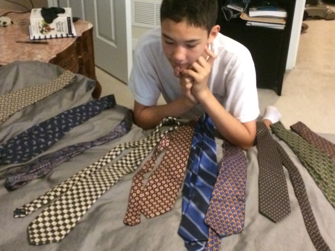 Picking out a tie.